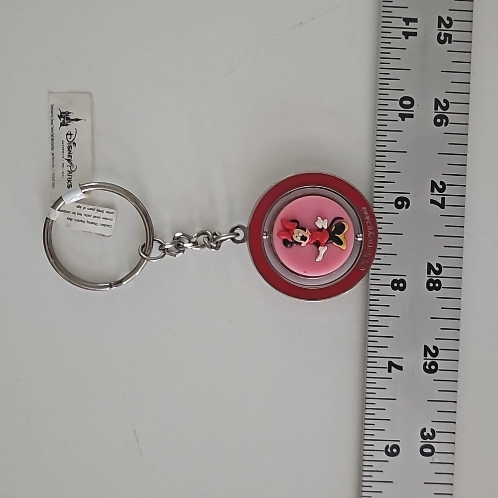 New Walt Disney Minnie Mouse Spinner Keychain featuring a cat design - Picture 4 of 8
